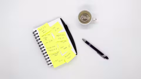 Notebook, coffee and pen